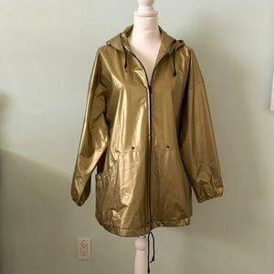 Women’s hooded raincoat, gold color size medium, 100% vinyl